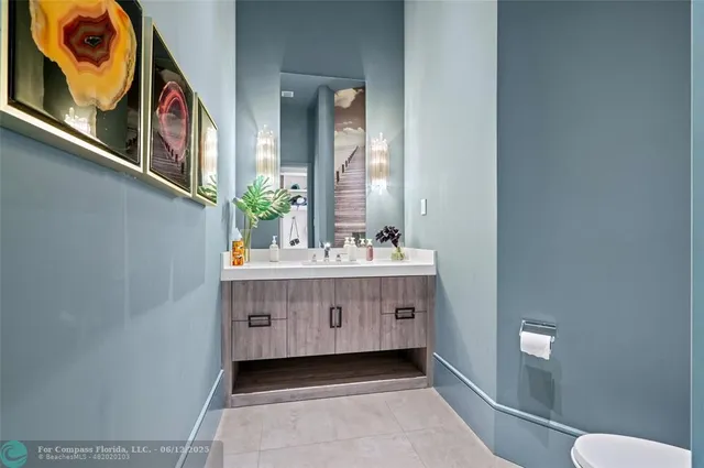 a bathroom with a toilet and a sink