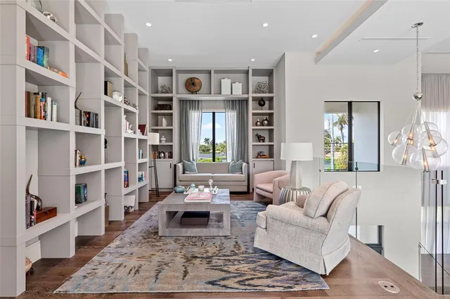 a living room with furniture and a rug