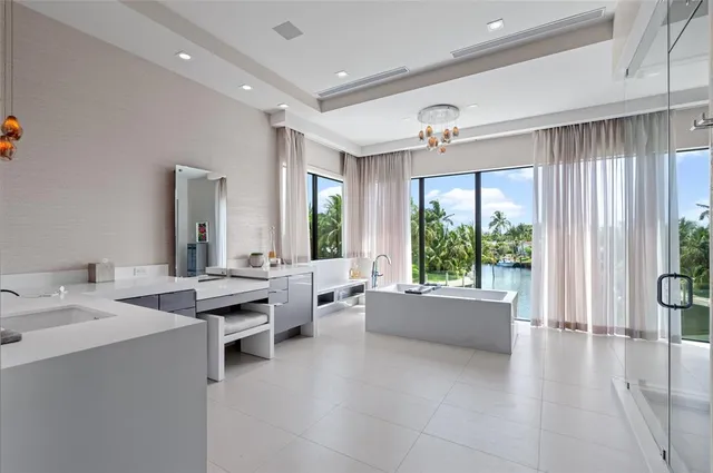 a lobby with a couch and a view of living room