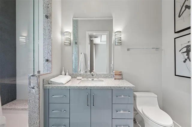 a bedroom with a bed and a table