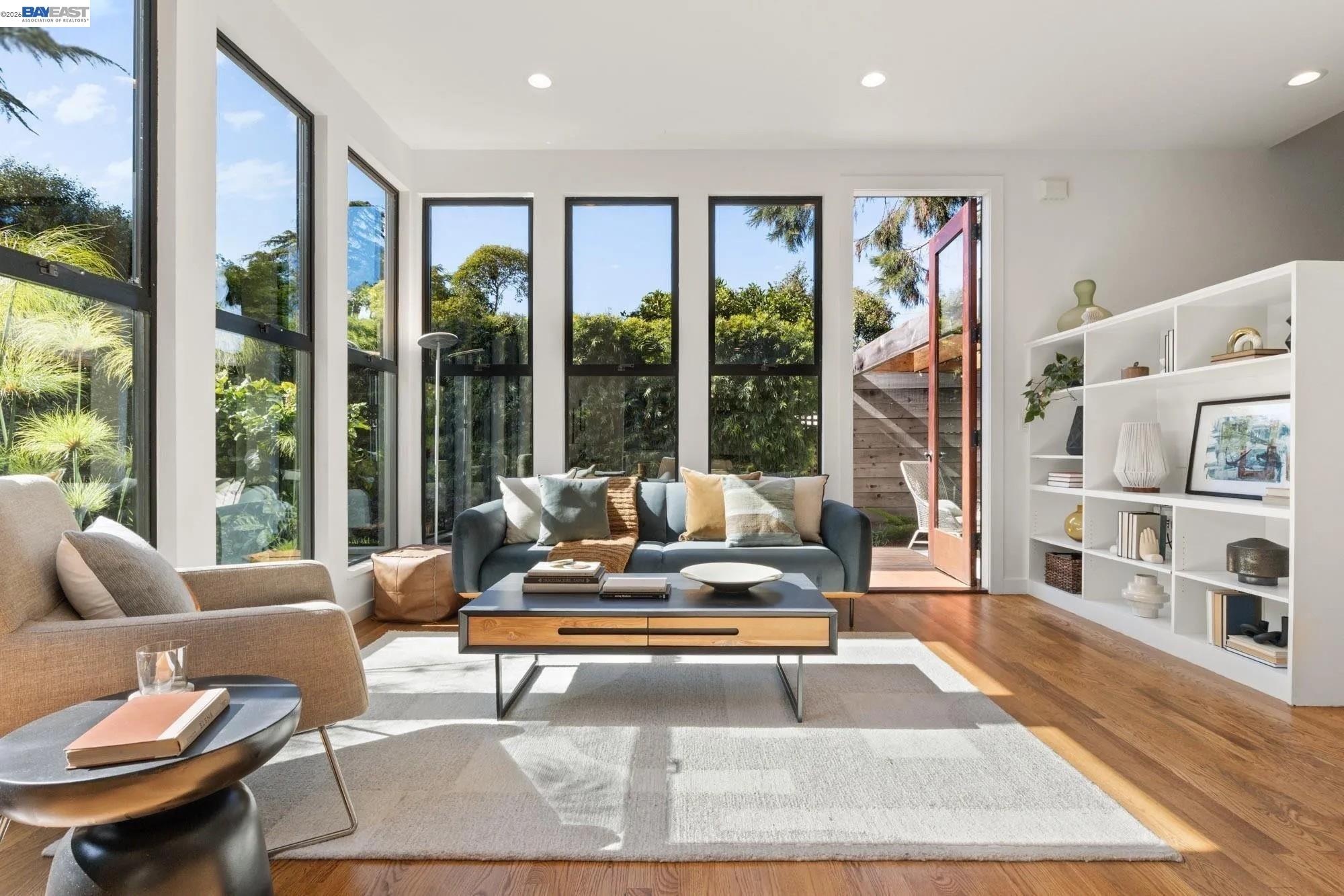 313 Spruce Street Alameda, CA 94501 - Photo 3 of 12 a living room with furniture and a large window