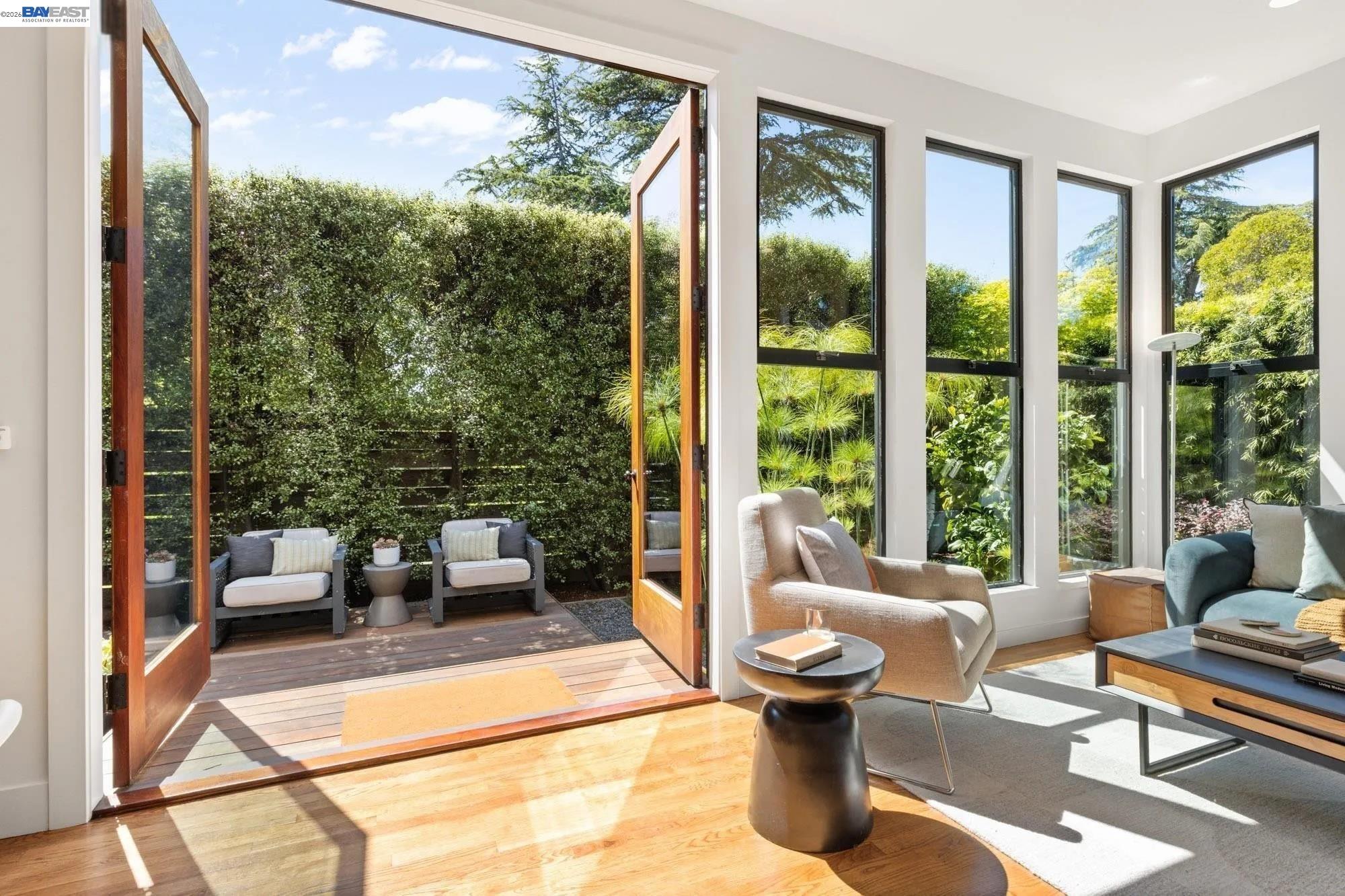 313 Spruce Street Alameda, CA 94501 - Photo 5 of 12 a living room with patio furniture and a potted plants