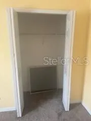 a view of backyard with a small cabin