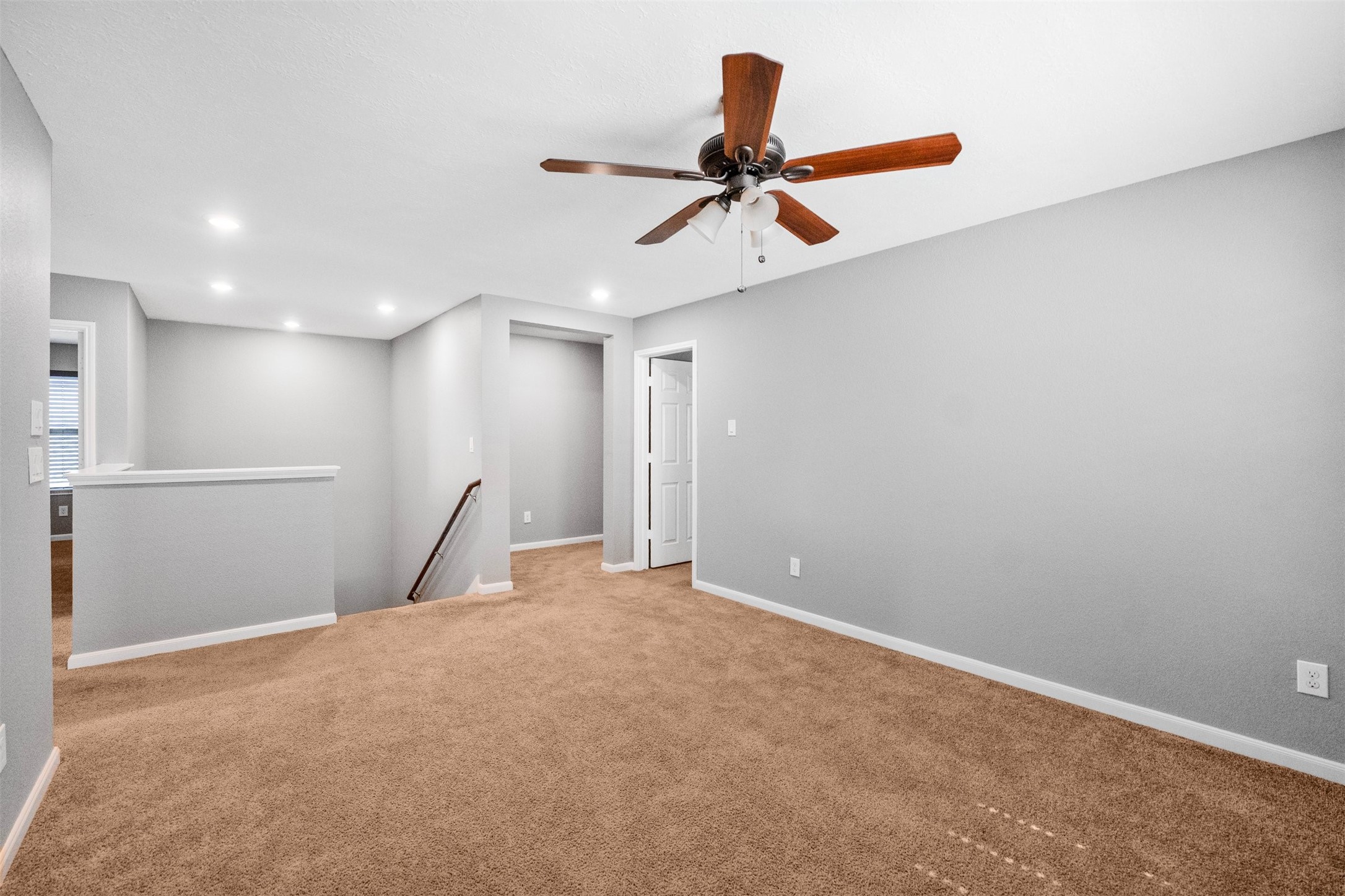1107 Epworth Ct. Conroe, TX 77304 - Photo 20 of 38 a view of a livingroom with a ceiling fan