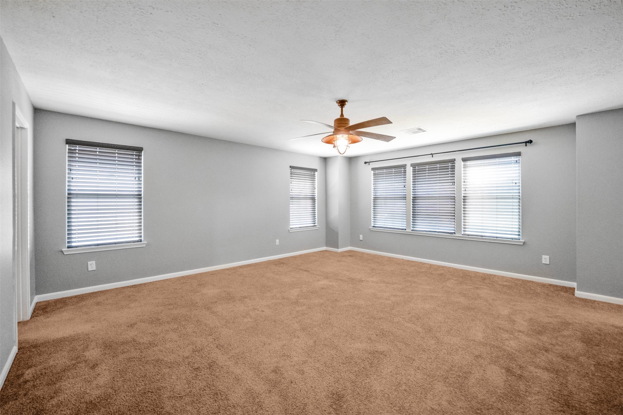 1107 Epworth Ct. Conroe, TX 77304 - Photo 22 of 38 a view of an empty room with a window