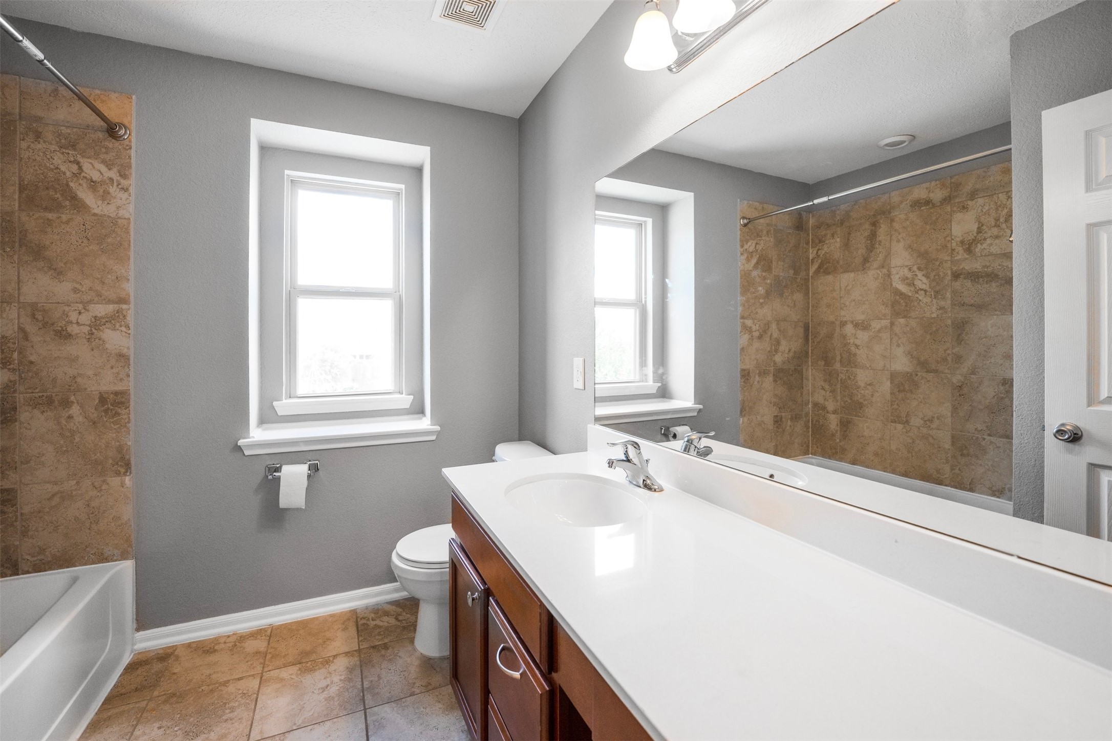 1107 Epworth Ct. Conroe, TX 77304 - Photo 29 of 38 a bathroom with a sink and a toilet