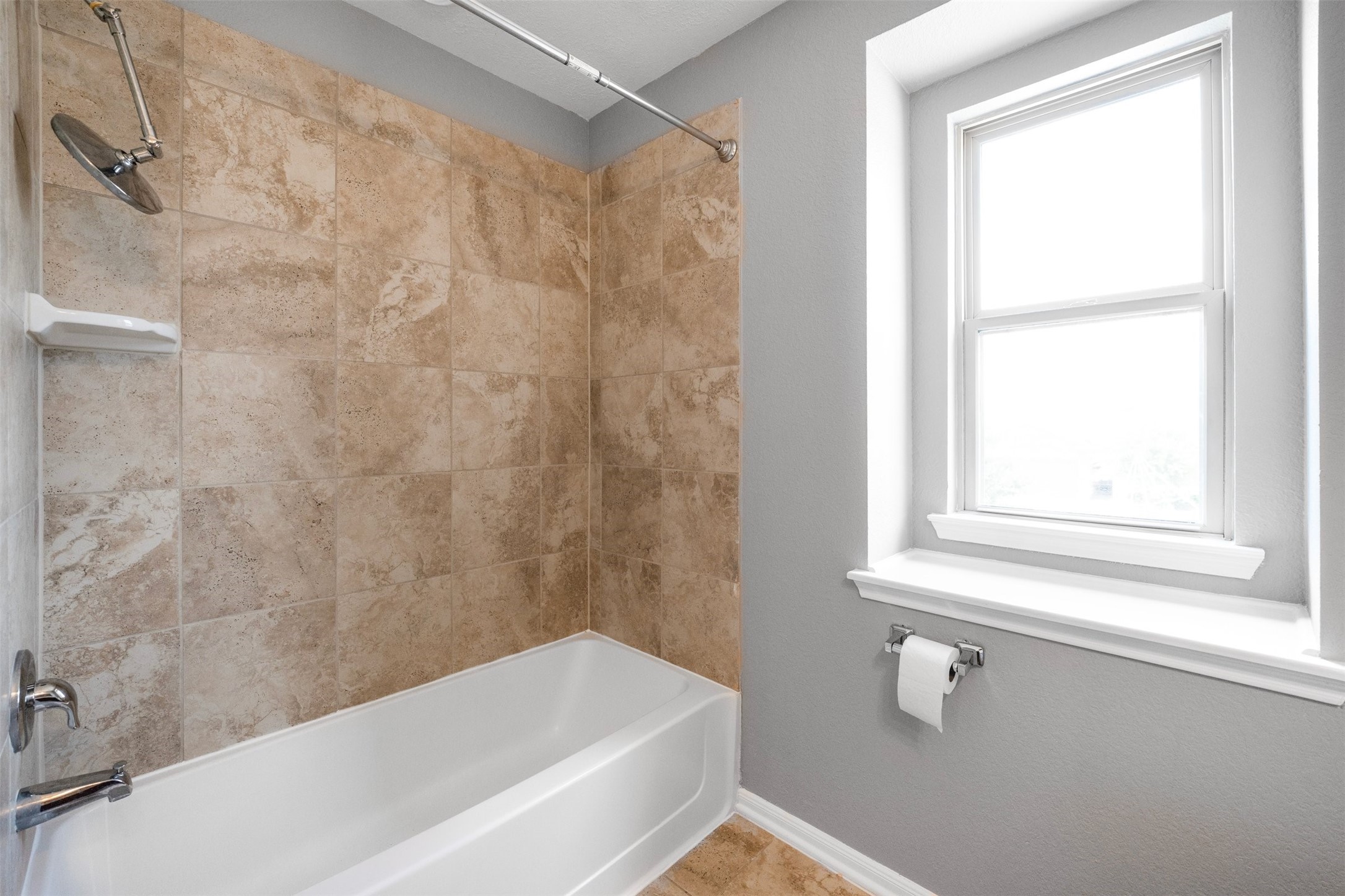 1107 Epworth Ct. Conroe, TX 77304 - Photo 30 of 38 a bathroom with a bathtub and shower