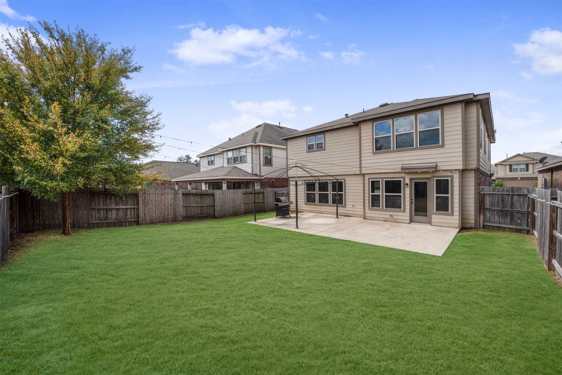1107 Epworth Ct. Conroe, TX 77304 - Photo 36 of 38 a house view with a garden space