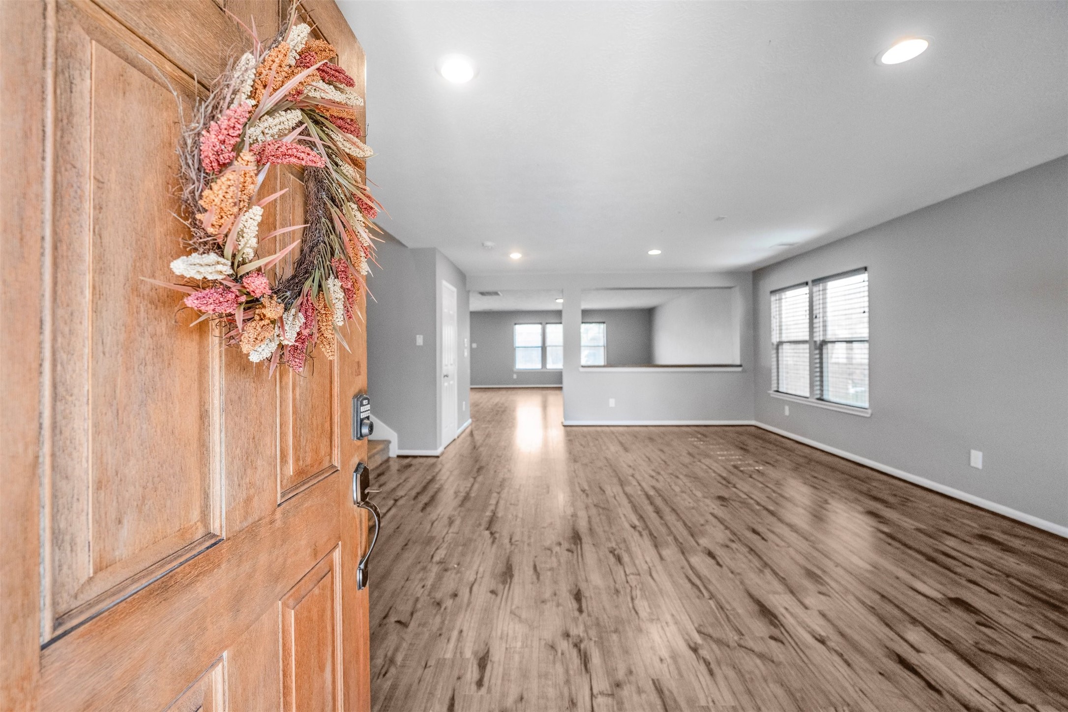 1107 Epworth Ct. Conroe, TX 77304 - Photo 5 of 38 a view of entryway and wooden floor