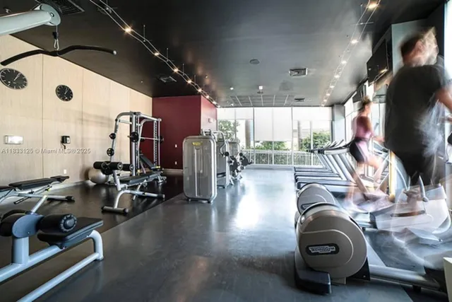 a view of a room with gym equipment