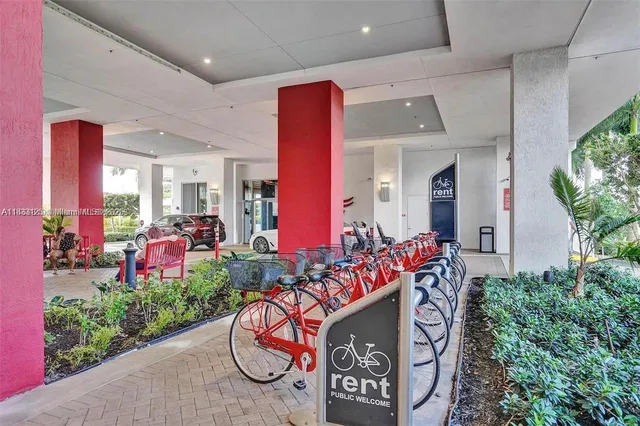 a group of people sitting in a yard