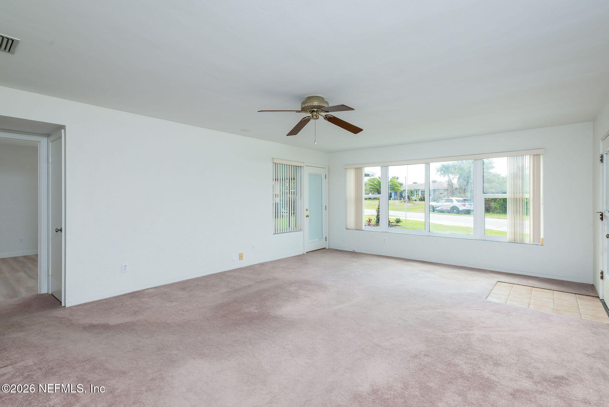 37 Berkley Road Ormond Beach, FL 32176 - Photo 12 of 33 a view of an empty room with a window