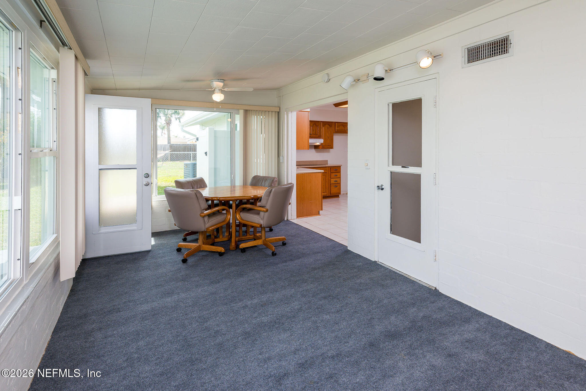 37 Berkley Road Ormond Beach, FL 32176 - Photo 17 of 33 a view of a room with furniture and a large window