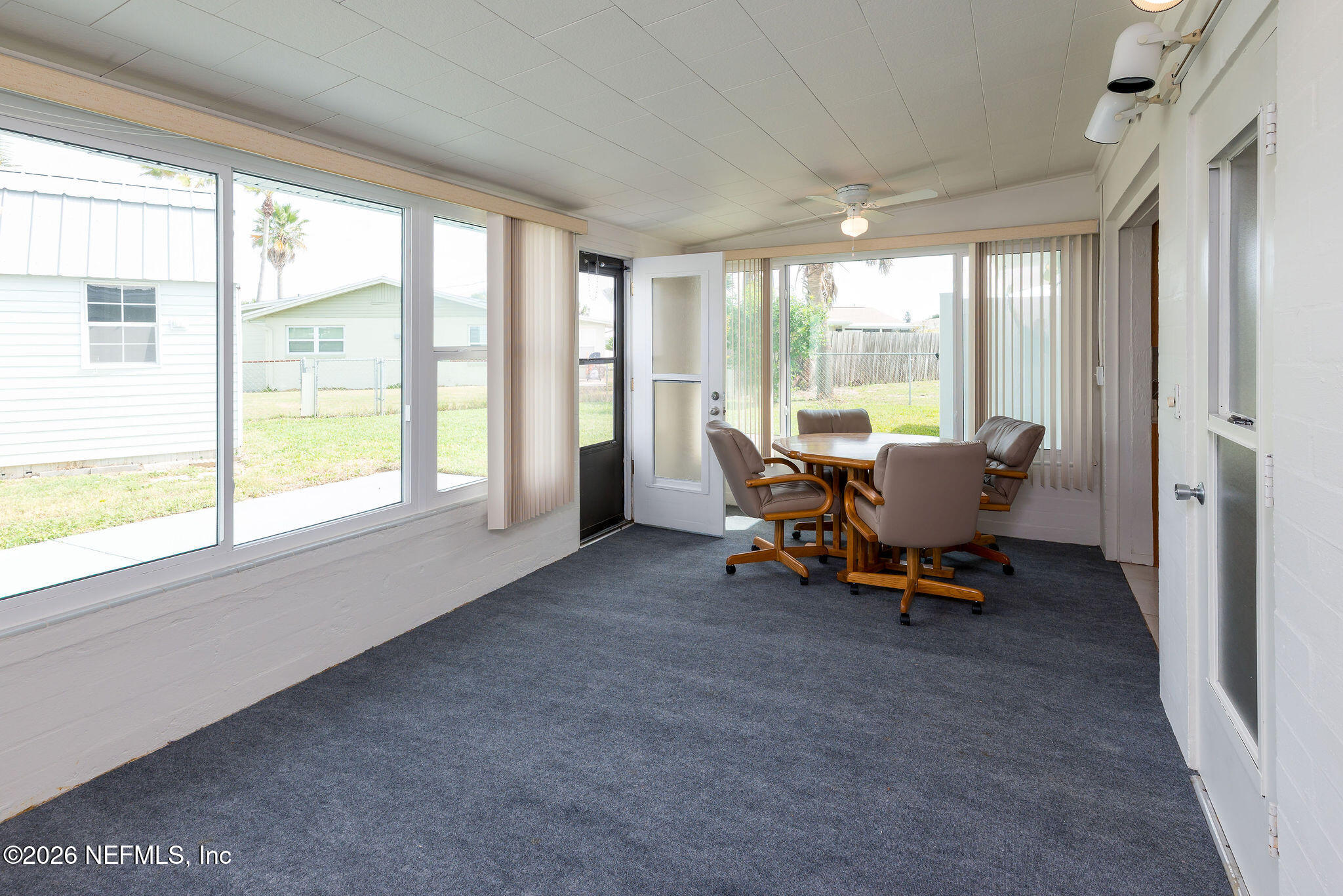 37 Berkley Road Ormond Beach, FL 32176 - Photo 18 of 33 a living room with furniture and a large window