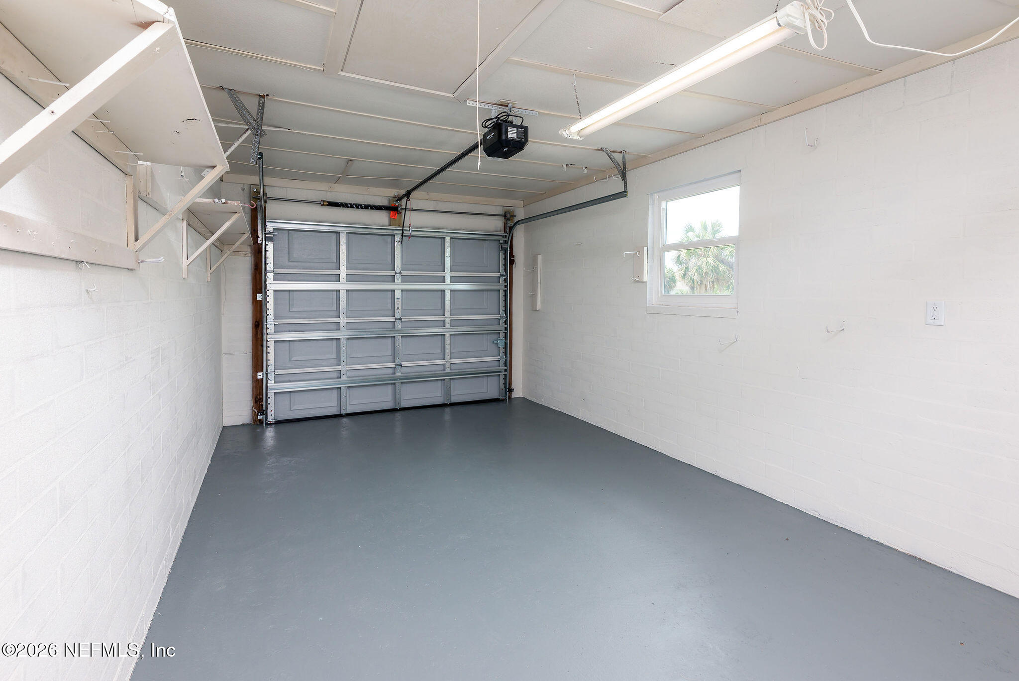 37 Berkley Road Ormond Beach, FL 32176 - Photo 25 of 33 a view of a garage