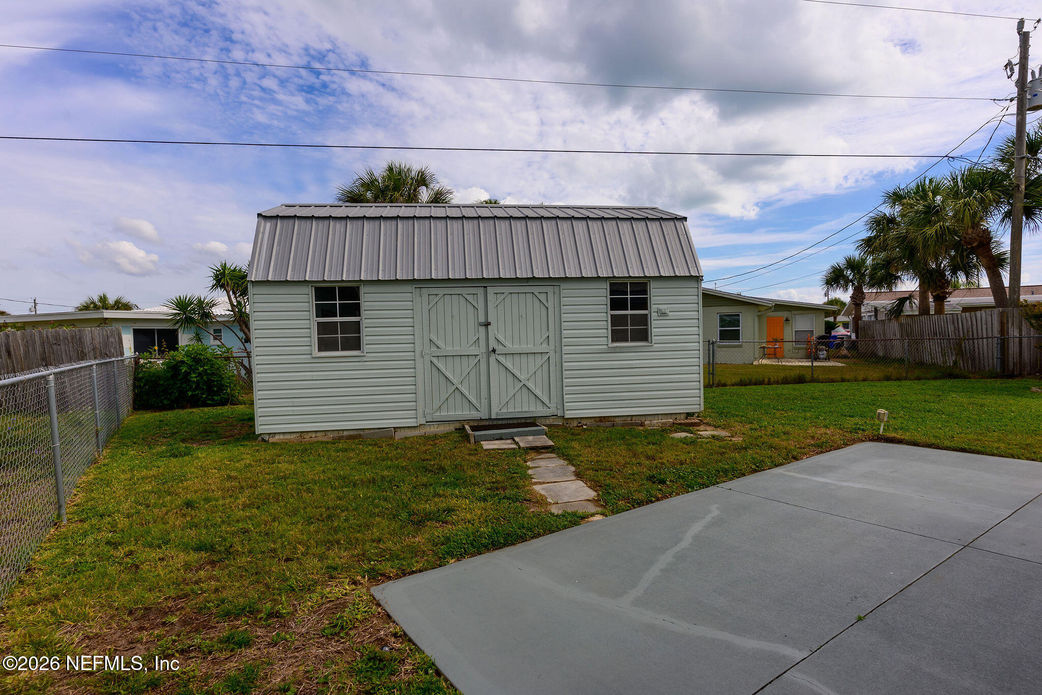 37 Berkley Road Ormond Beach, FL 32176 - Photo 8 of 33 a view of a house with a yard
