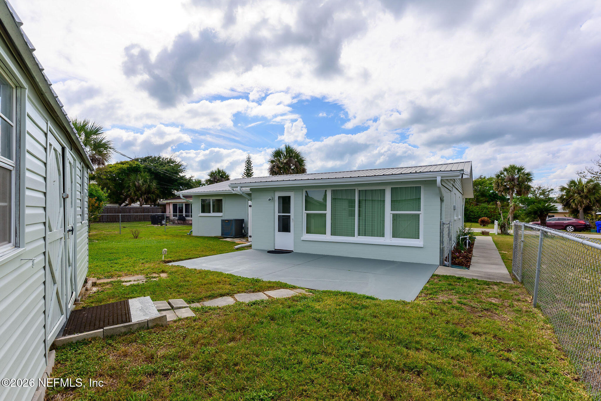 37 Berkley Road Ormond Beach, FL 32176 - Photo 9 of 33 front view of a house with a yard