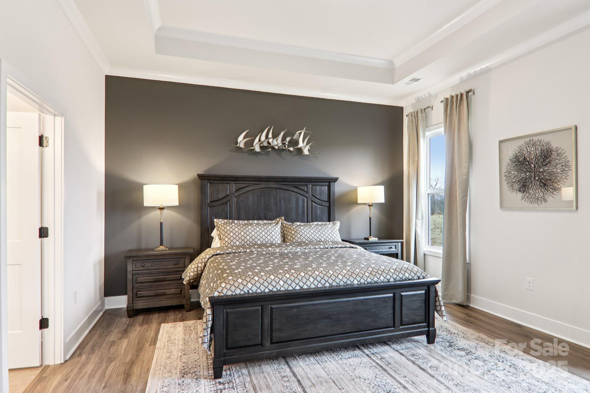 623 River Btm Road Fletcher, NC 28732 - Photo 18 of 48 a bedroom with a bed and a night stand