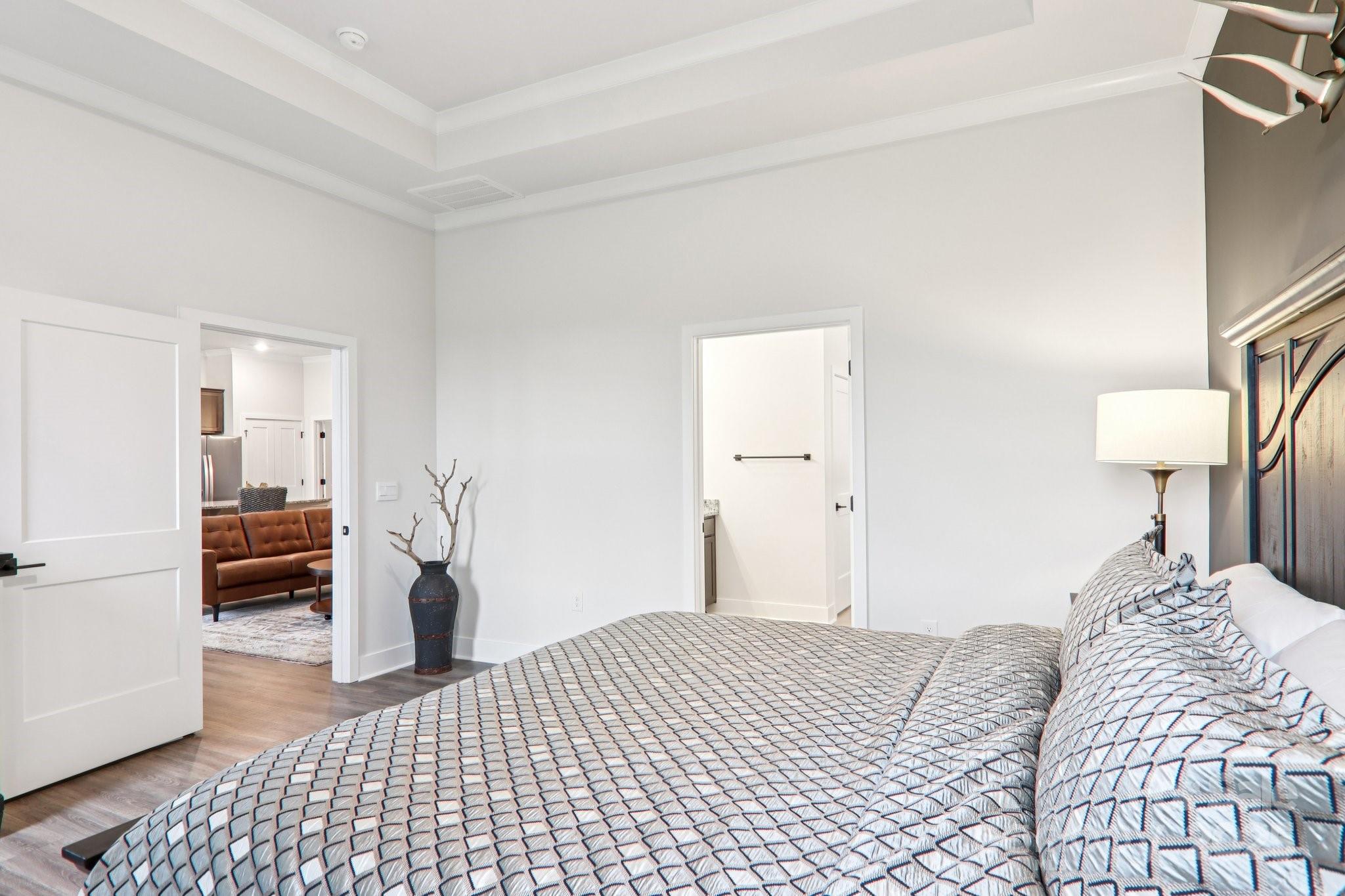 623 River Btm Road Fletcher, NC 28732 - Photo 21 of 48 a bedroom with a bed and a lamp