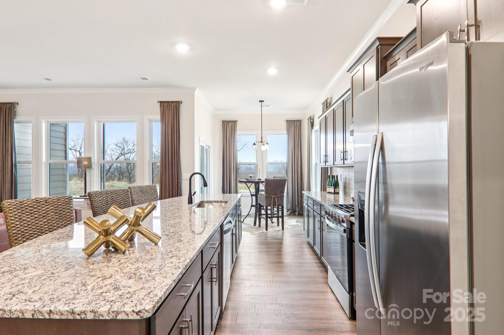 623 River Btm Road Fletcher, NC 28732 - Photo 5 of 48 a living room with stainless steel appliances granite countertop a couch a table and chairs