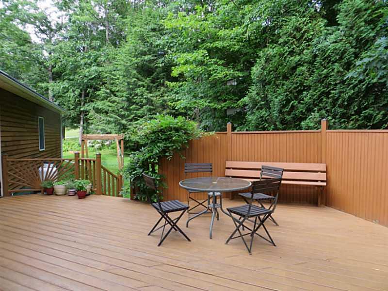15 Silver Ridge Road Bangor, ME 04401 - Photo 6 of 32 Patio/Deck. The fence around the...