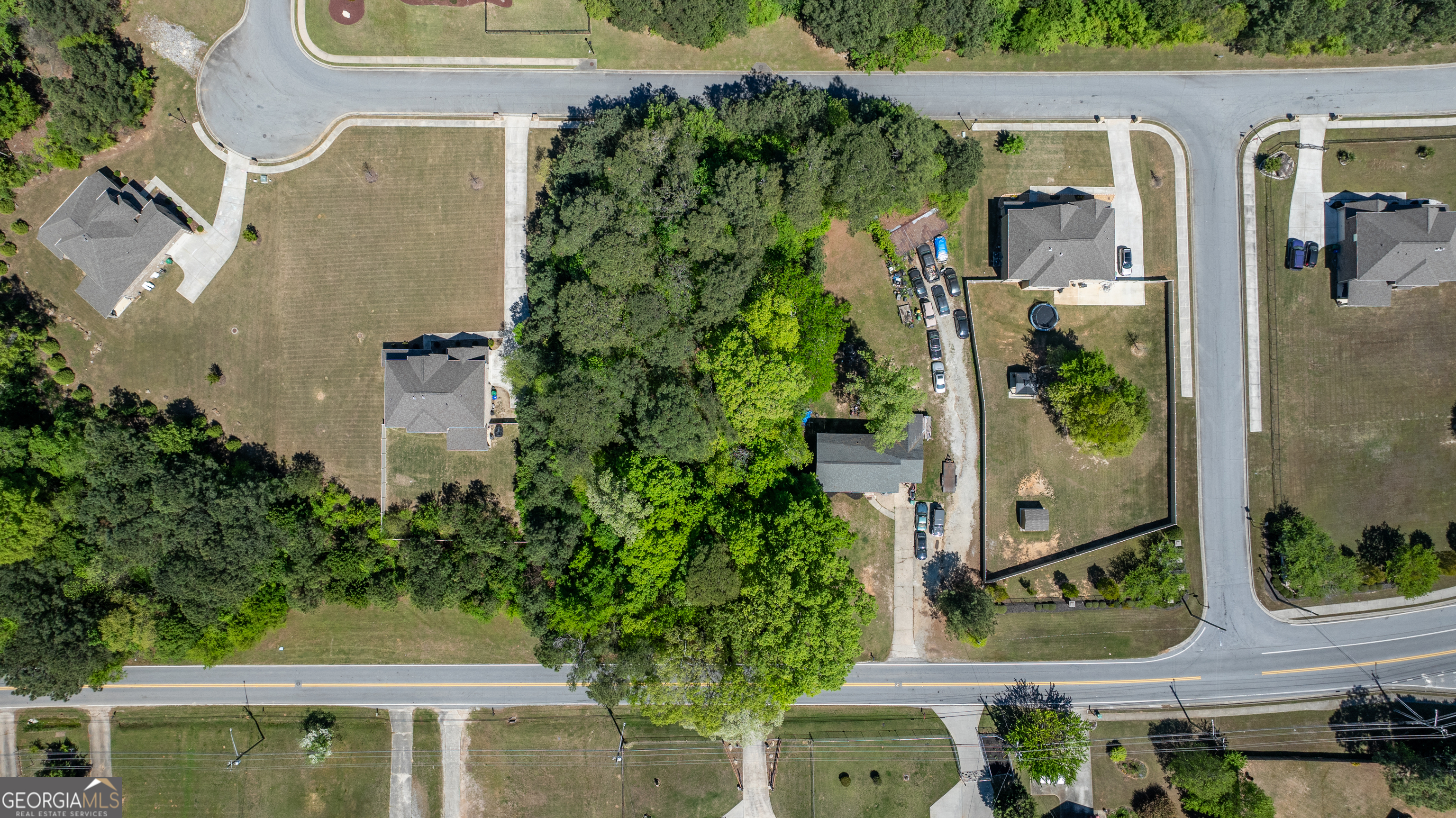 1868 Cedar Grove Road Conley, GA 30288 - Photo 12 of 19 an aerial view of a house with garden space and street view