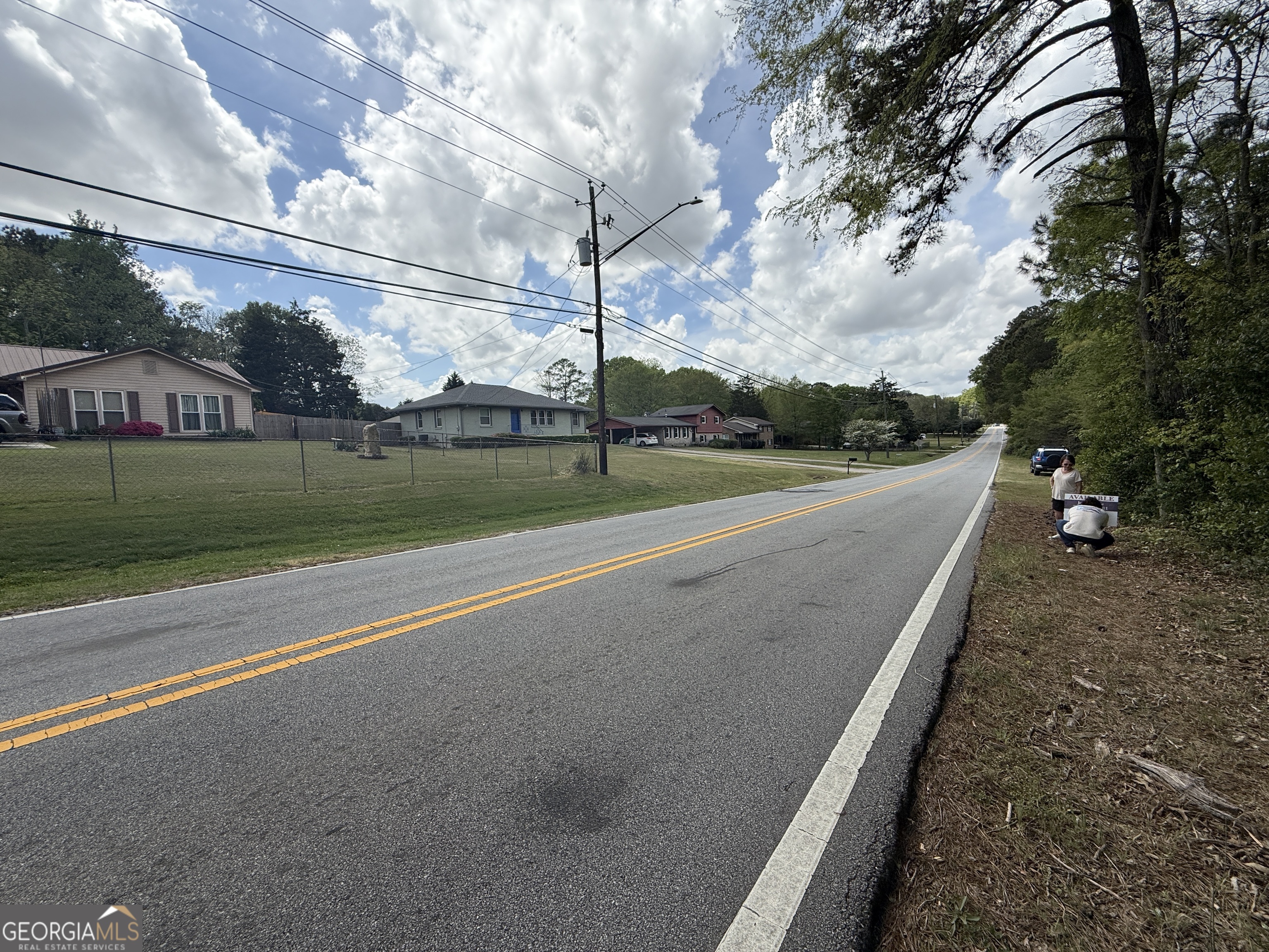 1868 Cedar Grove Road Conley, GA 30288 - Photo 10 of 19 a view of a road with a yard