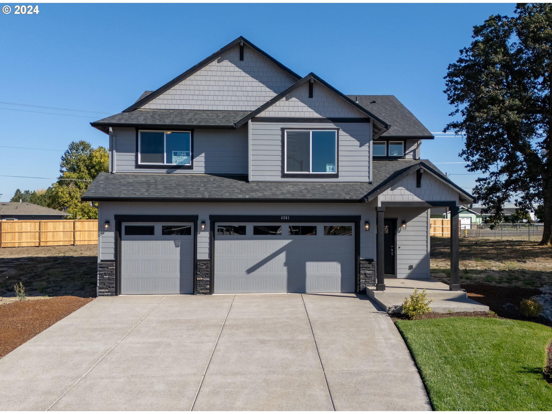 4361 Chaparal Place Albany, OR 97321 - Photo 1 of 36 a front view of a house with a yard and garage