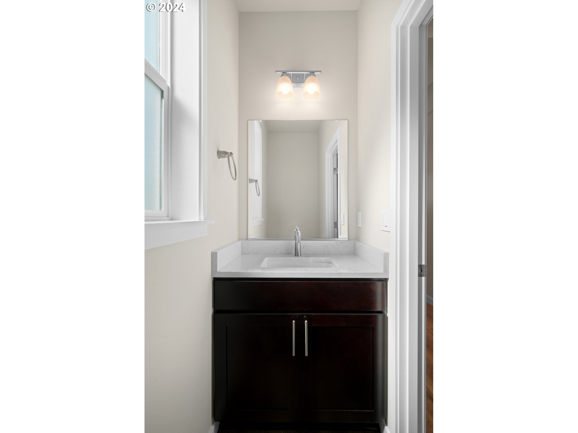 4361 Chaparal Place Albany, OR 97321 - Photo 11 of 36 a bathroom with a sink and a mirror