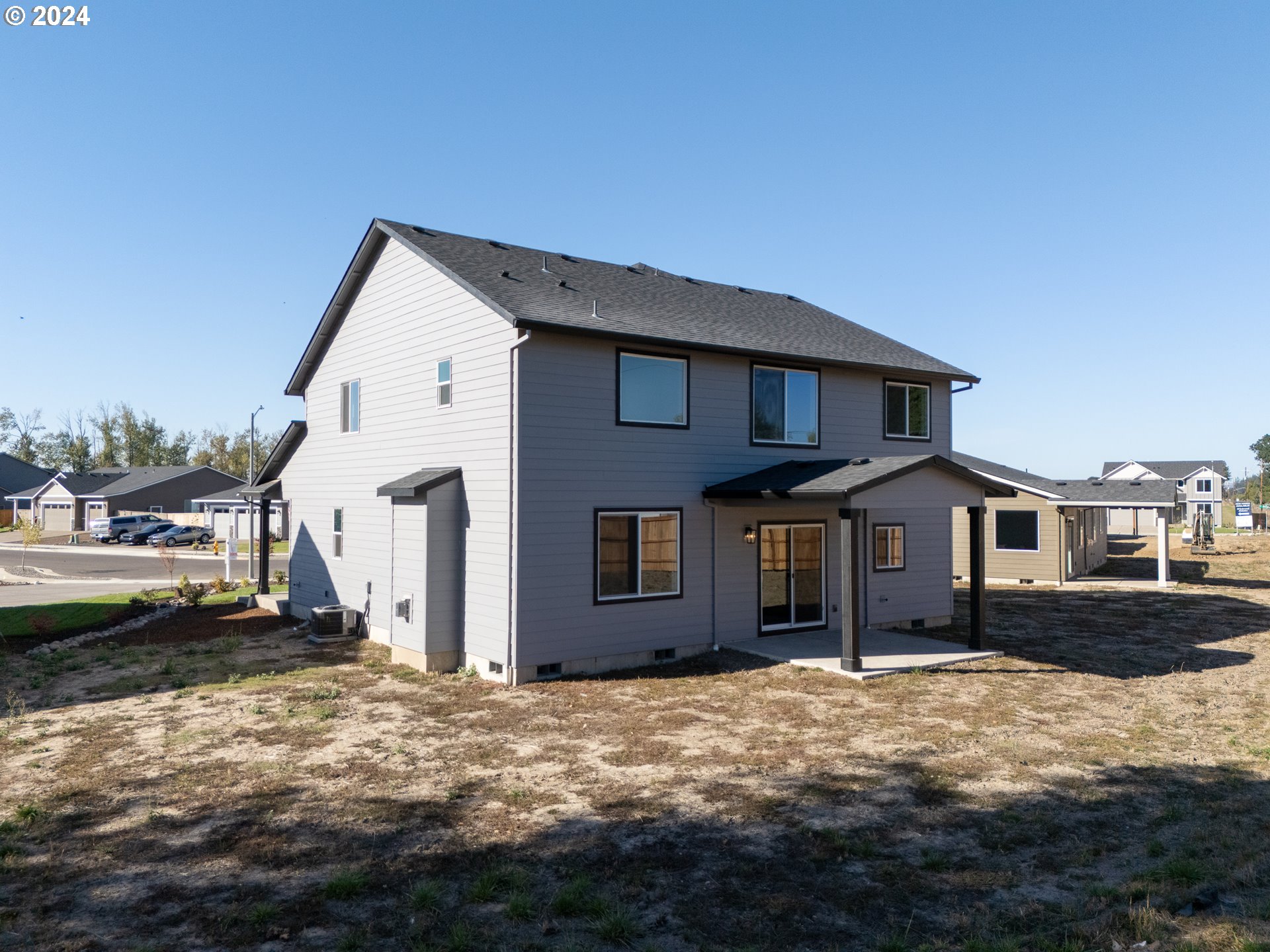 4361 Chaparal Place Albany, OR 97321 - Photo 29 of 36 a front view of a house with a yard