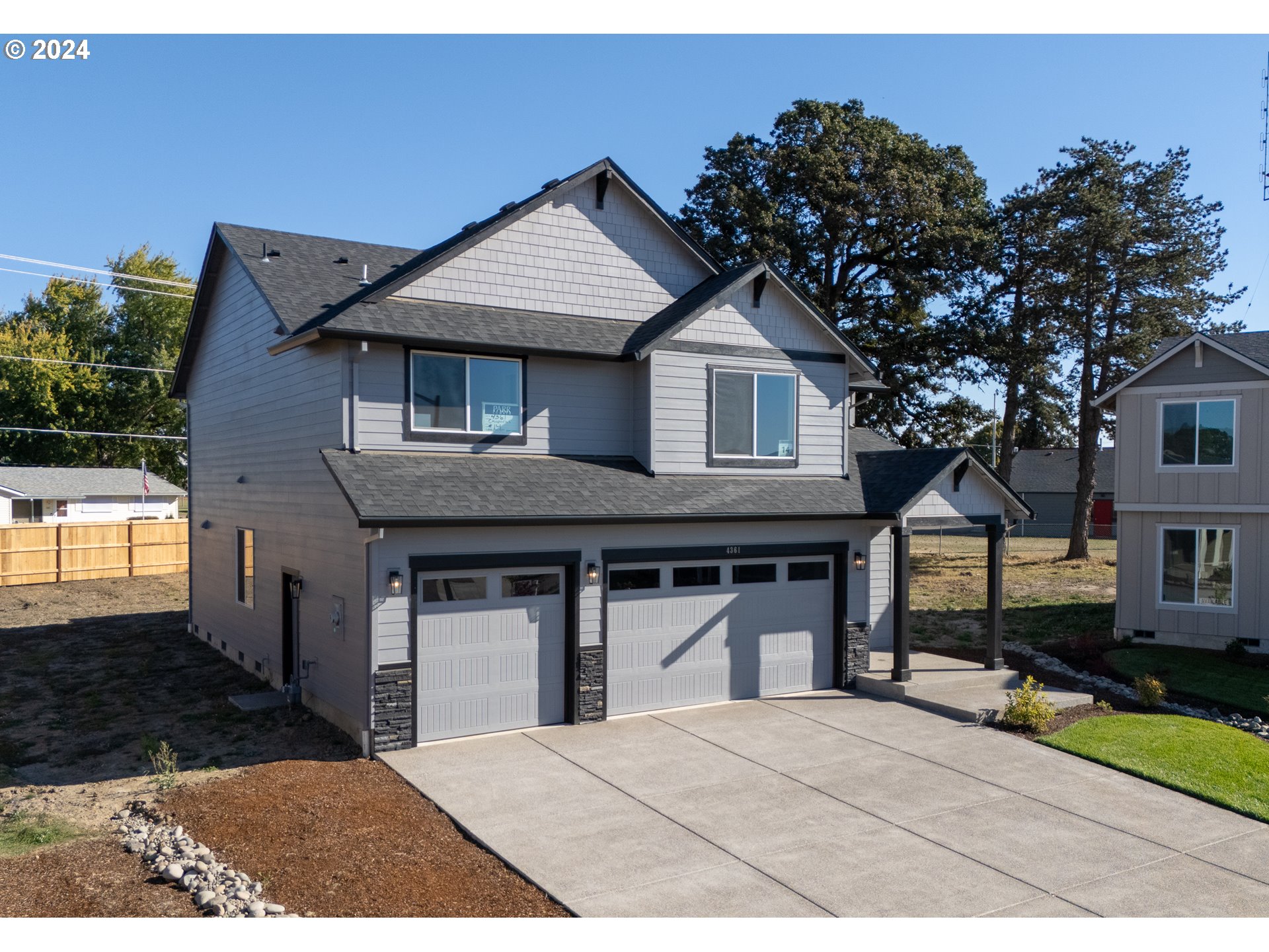 4361 Chaparal Place Albany, OR 97321 - Photo 36 of 36 a front view of a house with a garden