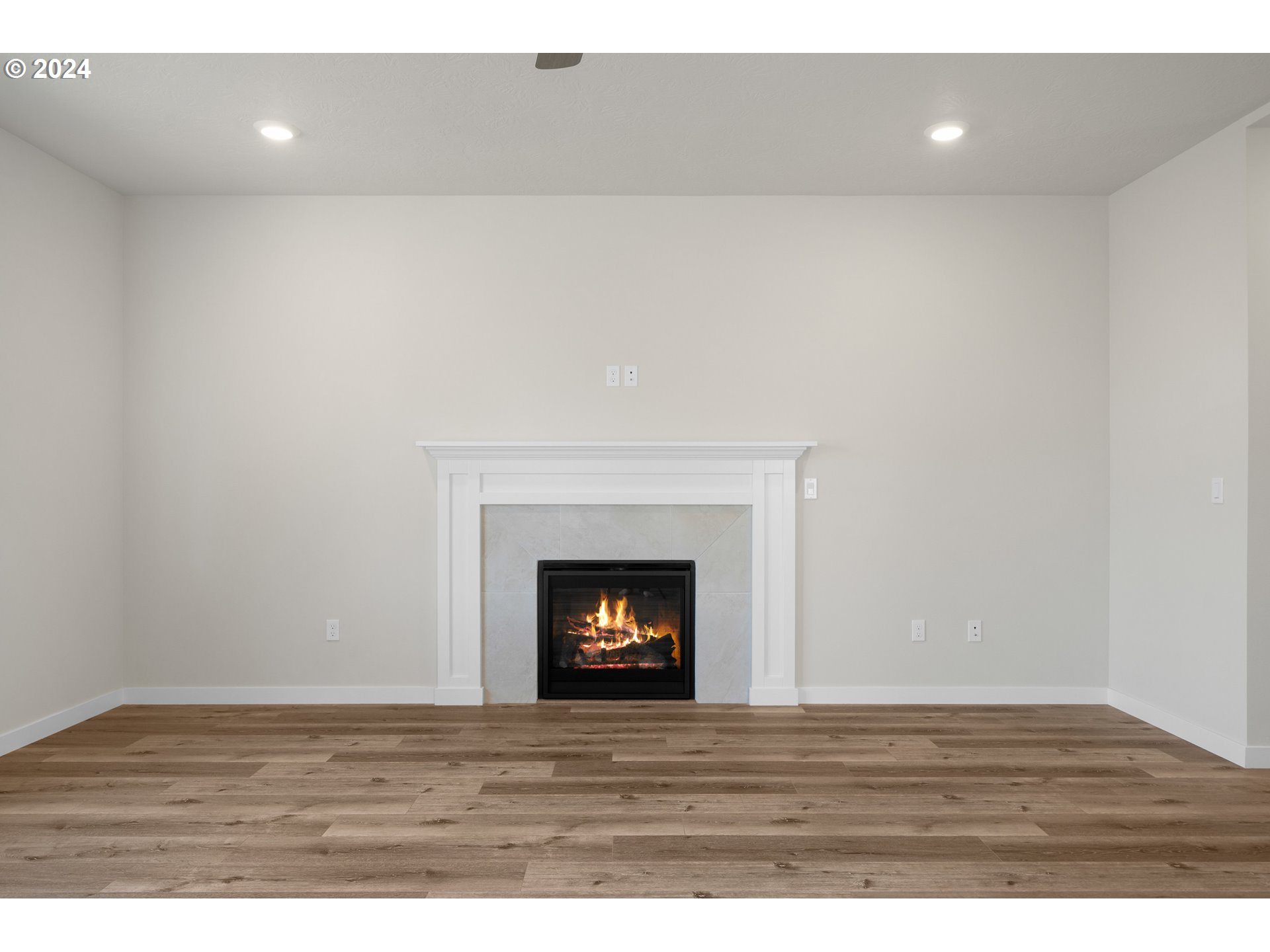 4361 Chaparal Place Albany, OR 97321 - Photo 9 of 36 a view of an empty room with wooden floor and fireplace