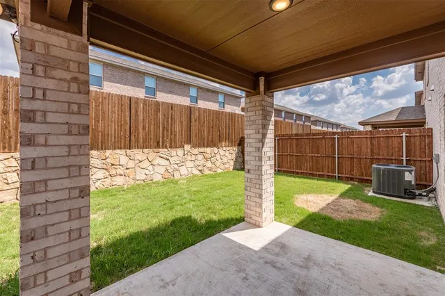 a view of a backyard with a garden