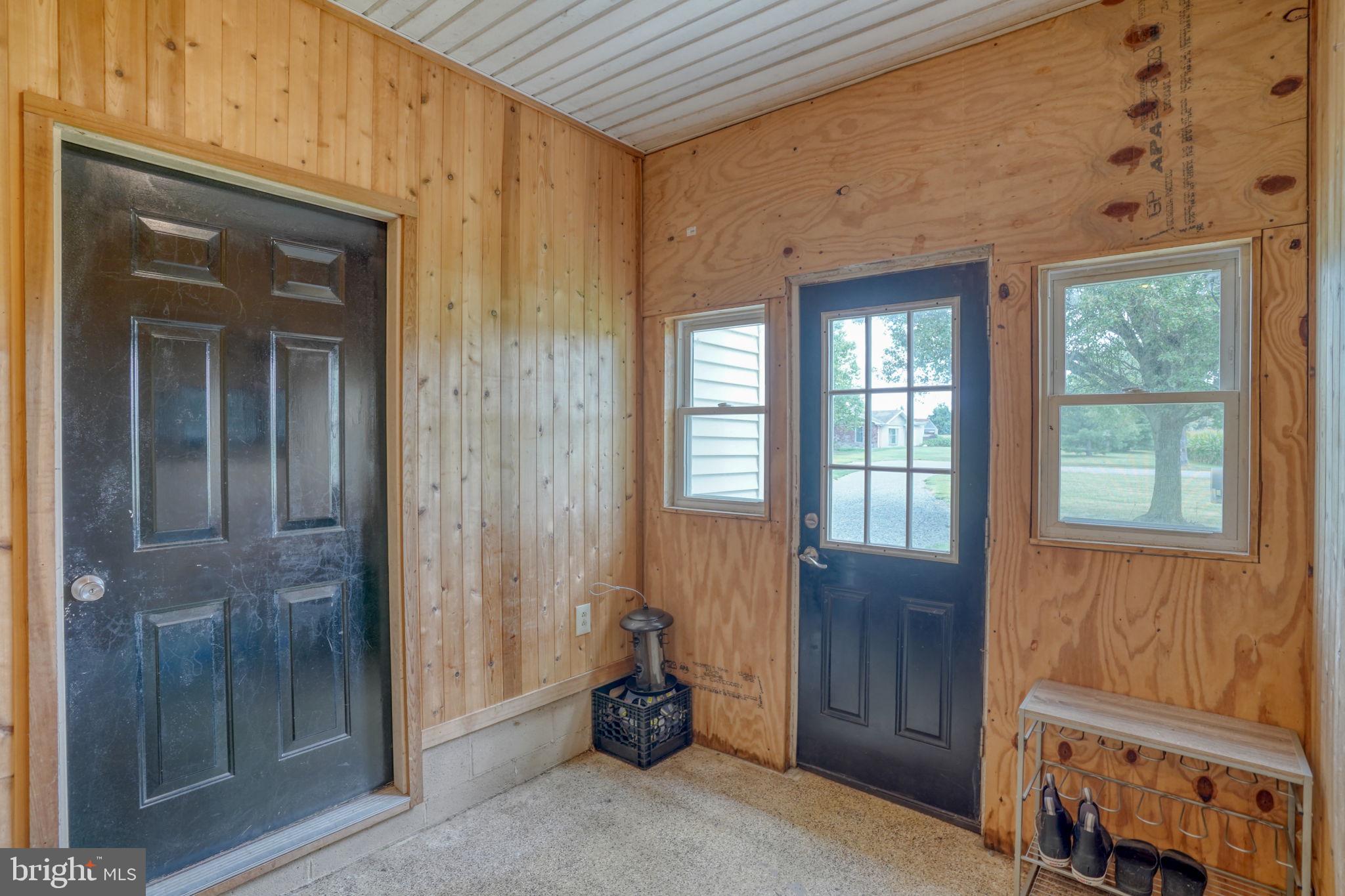 513 Watson Road Centreville, MD 21617 - Photo 11 of 47 Garage Entrance Breezeway w/ cedar walls