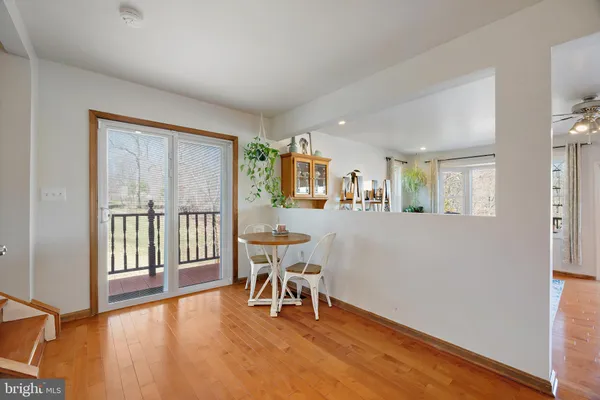 a living room with fireplace furniture and a flat screen tv