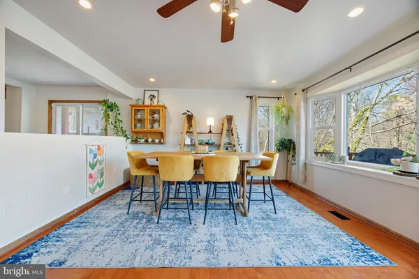 a view of a room that has a bed