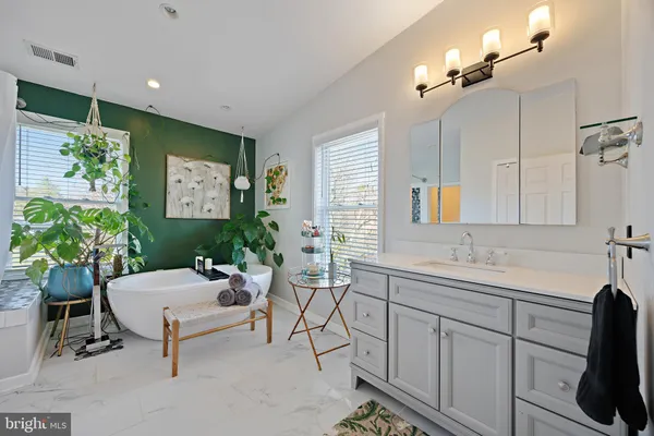 a bedroom with a bed and a closet