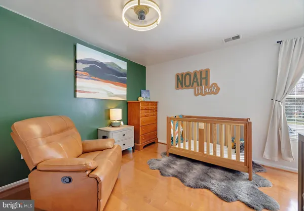 a room with stainless steel appliances sink and washing machine