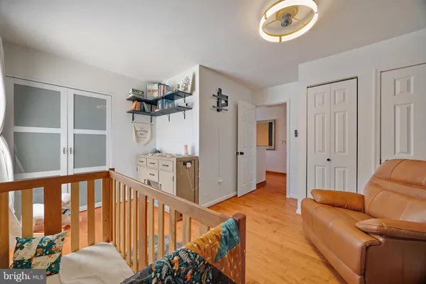 a view of a pathway of a building from a balcony