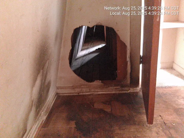 a view of a room with racks on the wall