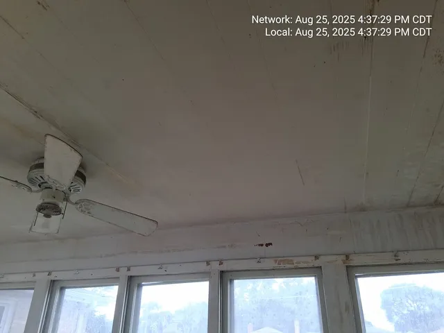 a kitchen with a sink and a window