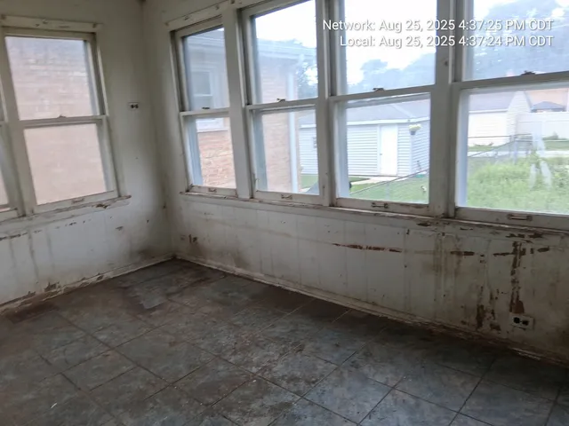 an empty room with a window
