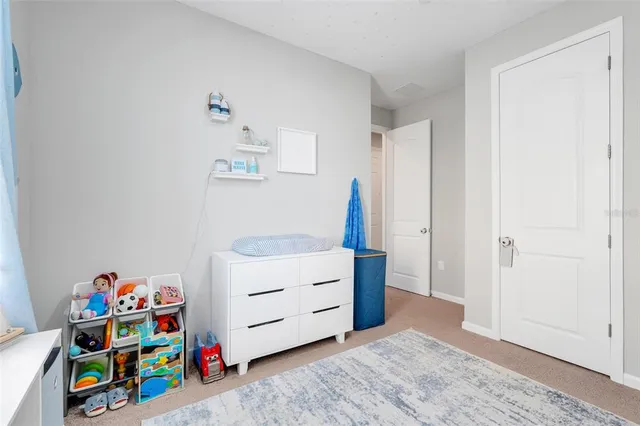 a room with toys and wooden floor