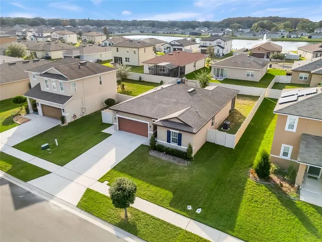 an aerial view of a house with a garden