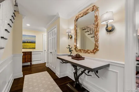 a bathroom with a sink a mirror and a shower