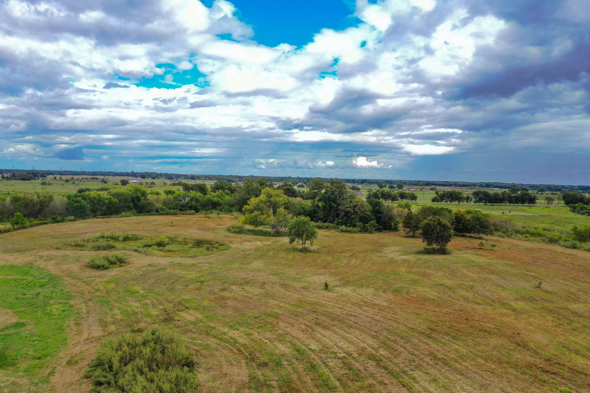 a view of a lake with a yard