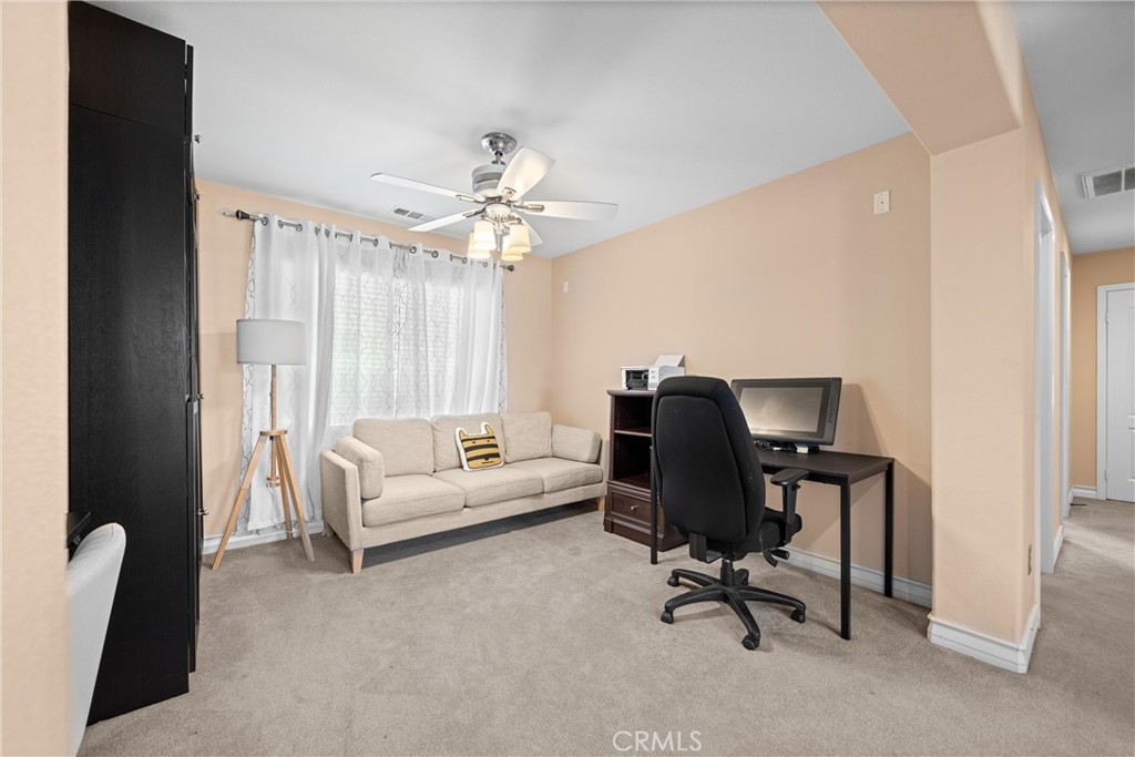 29021 Mirada Circulo Valencia, CA 91354 - Photo 20 of 46 a view of a livingroom with workspace and a couch