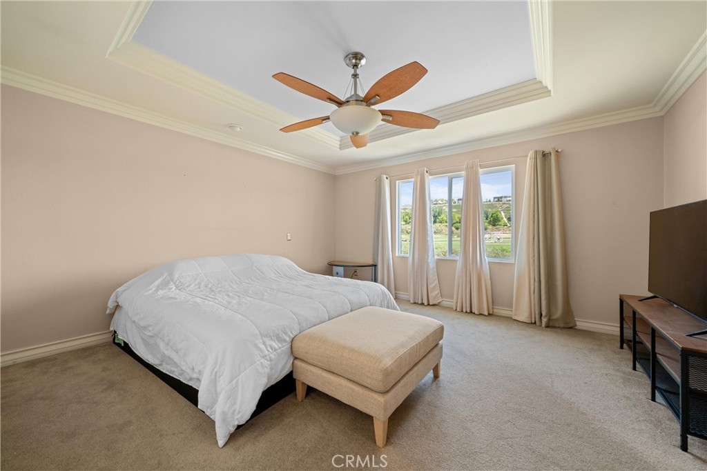 29021 Mirada Circulo Valencia, CA 91354 - Photo 24 of 46 a bedroom with a bed dresser and a window
