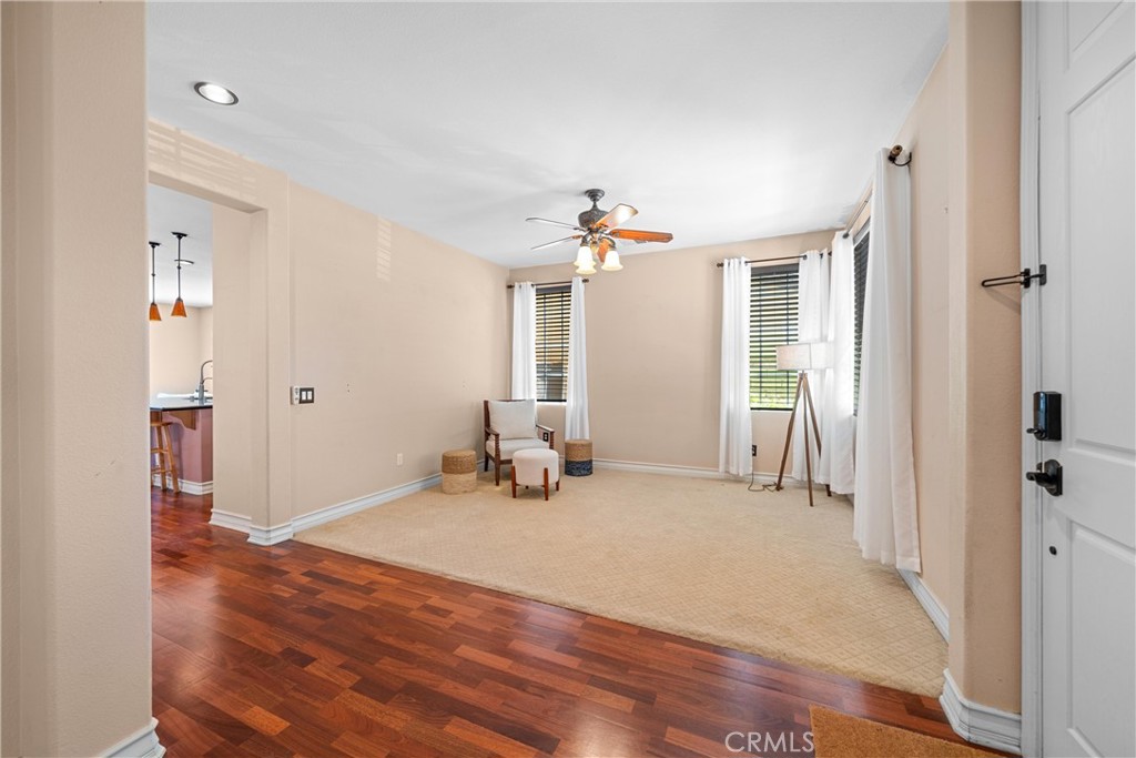 29021 Mirada Circulo Valencia, CA 91354 - Photo 7 of 46 wooden floor in an empty room with a window