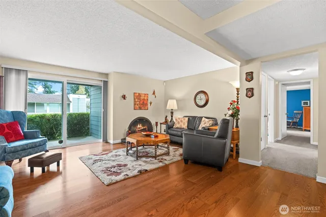 a living room with furniture and a large window